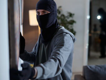 Criminal Wearing Mask Stealing Painting during Home Burglary criminal wearing mask stealing painting home burglary