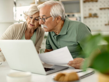Senior couple analyzing their savings while going through home f senior couple analyzing their savings while going through home finances scaled