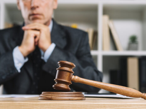 wooden judge gavel table front lawyer scaled