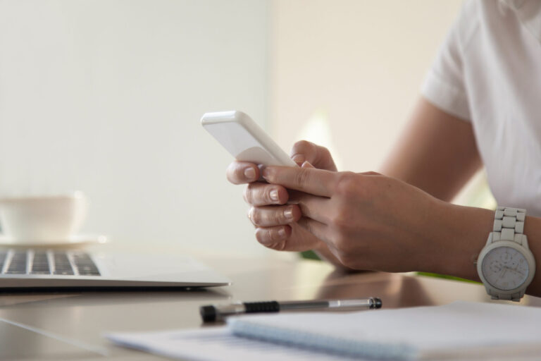 businesswoman looking important contact phone scaled