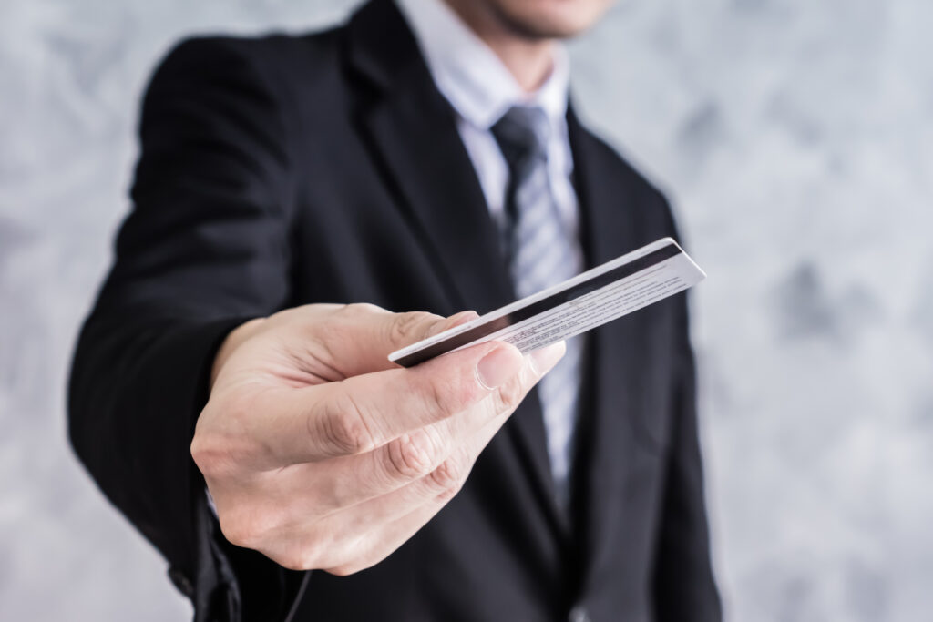 close up of businessman holding credit card 2023 11 27 05 31 50 utc