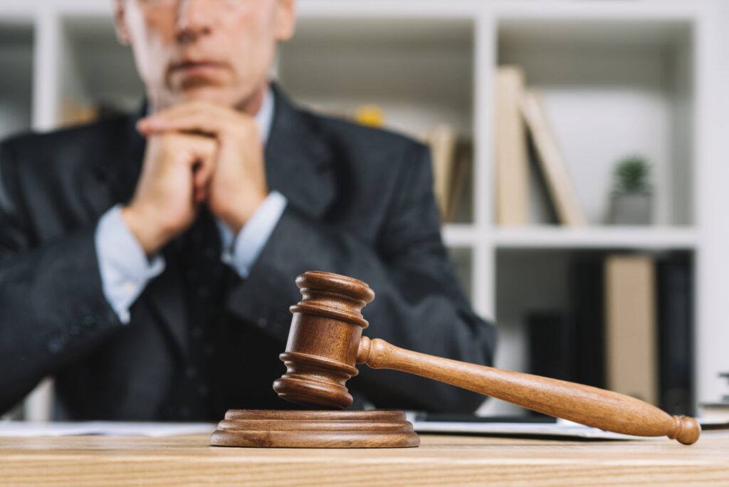 wooden judge gavel table front lawyer scaled
